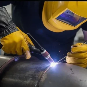 Welder using ARASWELD split-cowhide TIG welding gloves for precision pipe fabrication