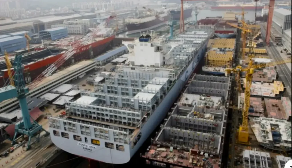Shipbuilding and marine welding facility where heavy-duty arasweld welding gloves are used during large vessel construction and steel fabrication.