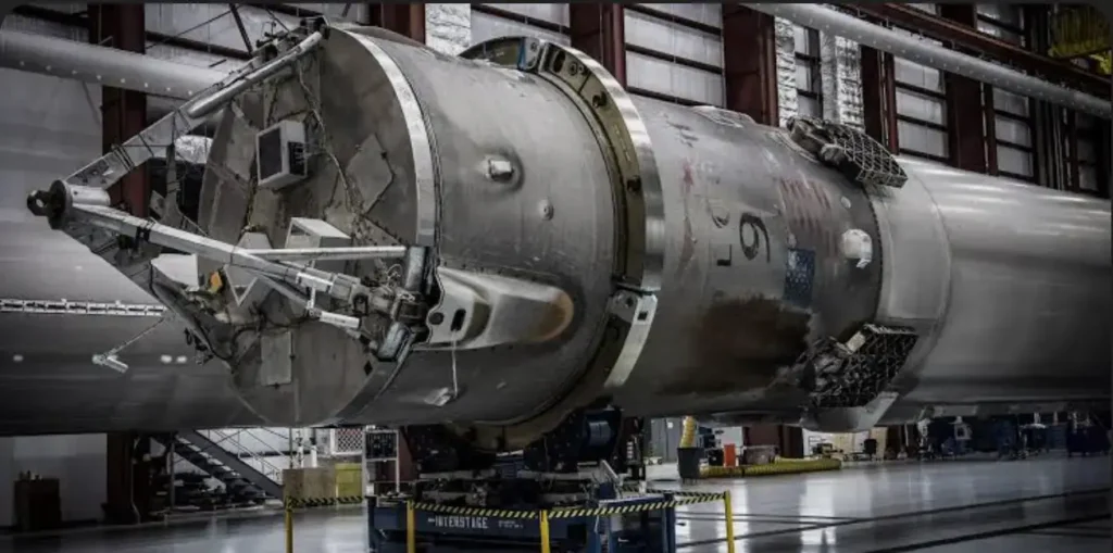 Arasweld protective welding gloves in use within a high-precision aerospace & defense manufacturing facility, where they provide essential thermal and mechanical protection during the assembly of large-scale rocket fuselage components and defense-grade structural airframes.